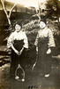 大正8（1919）年から昭和のはじめ頃まで谷保尋常高等小学校（現 国立第一小学校）で教師をしていた石川ヤス子先生のアルバムから。記された数字から、大正13（1924）年5月26日の撮影とみられます。テニスを楽しんだ後のようで、笑顔の女性が2人（右が石川先生）。約100年前のテニス姿、今とはかなり違っていますね。